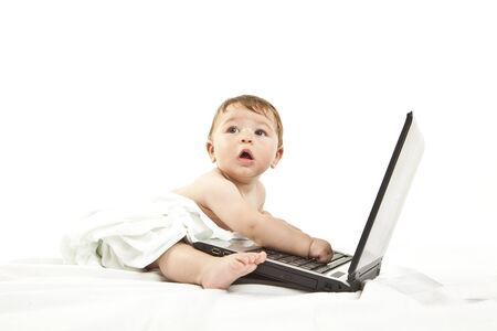cute little baby using a pcの写真素材