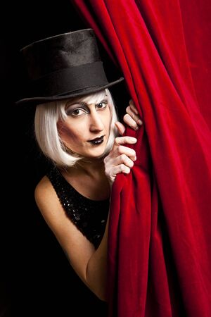 cabaret performer on stage looking at the audienceの写真素材