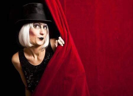 cabaret performer on stage looking at the audienceの写真素材