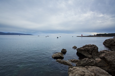 fishermen working in the evening in croatiaの写真素材
