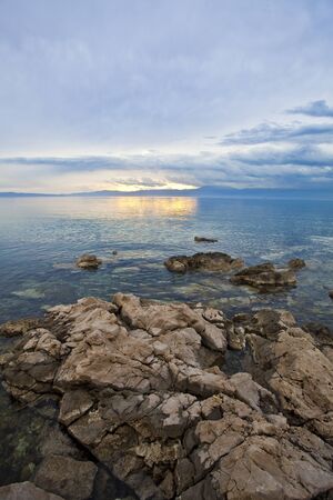sunset on the sea in croatiaの写真素材