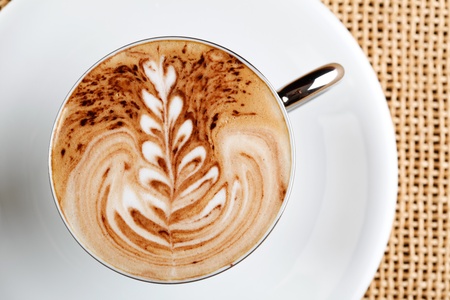 art latte on a cappuccino coffe cupの写真素材