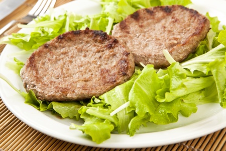 two hamburger on green lettuceの写真素材