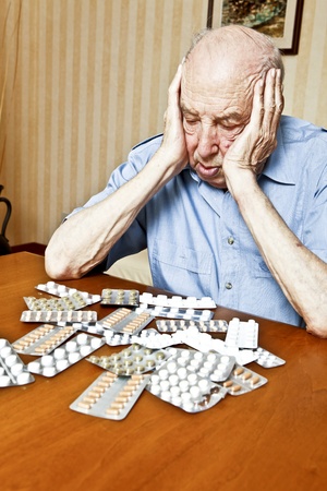 elder man with pillsの写真素材