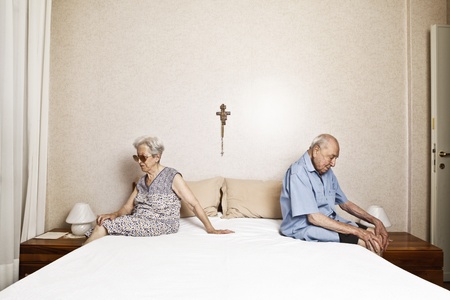 elderly couple in the bedroomの写真素材