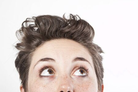 close up portrait of a woman looking upの写真素材