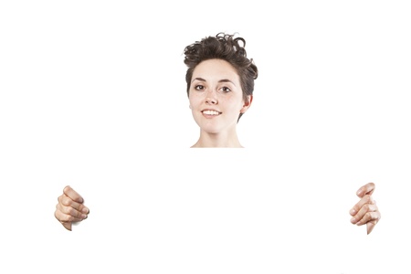 beautiful young girl holding an empty white posterの写真素材