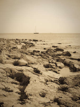 rocky shore in croatia, vintage effectの写真素材