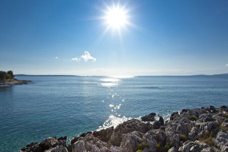 beautiful rocky beach in croatiaの写真素材