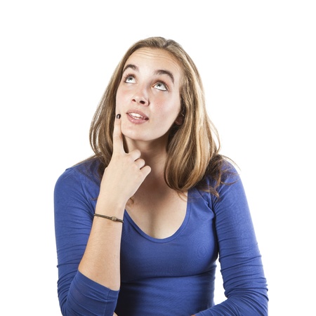 Portrait of a smiling thinking woman looking up - isolated on whiteの写真素材