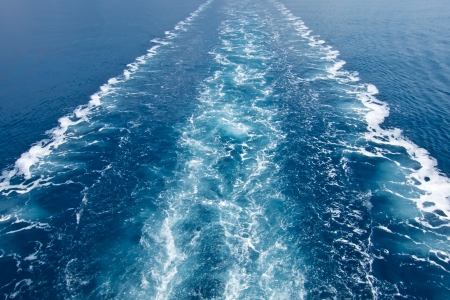 Wake in the ocean made by cruise shipの写真素材