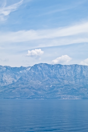 Summer panoramic view of the sea and mountain range, croatiaの写真素材