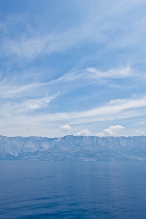 Summer panoramic view of the sea and mountain range, croatiaの写真素材