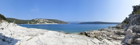 panoramic view of a beautiful rocky beach in croatia, blue seaの写真素材