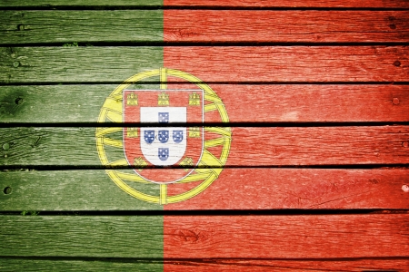 portuguese, portugal flag painted on old wood plank backgroundの写真素材