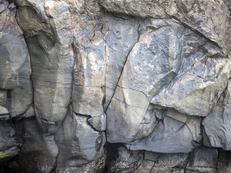 Walls built from natural volcanic stone for background image