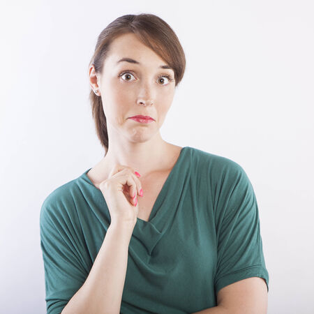 young beautiful woman surprise face expressionの写真素材