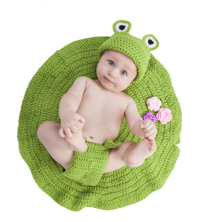 portrait of a cute newborn baby with a frog costumeの写真素材
