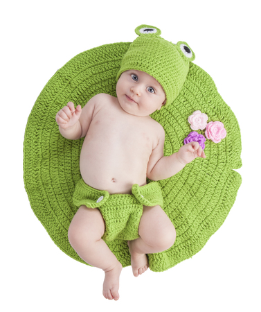 portrait of a cute newborn baby with a frog costumeの写真素材