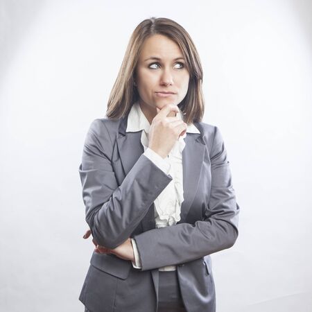 beautiful young businesswoman portrait, thinking face expressionの写真素材