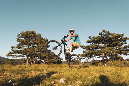 Man riding his mountain bike outdoor in natureの写真素材