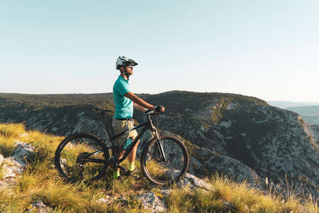 Man riding his mountain bike outdoor in natureの写真素材
