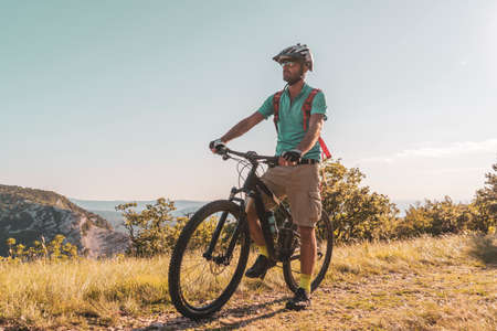 Man riding his mountain bike outdoor in natureの写真素材