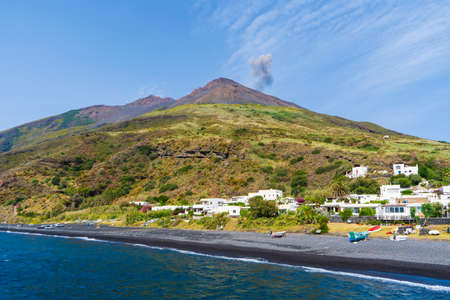 The majestic Eolian island of Stomboli view from the sea, active volcano in Italyの写真素材