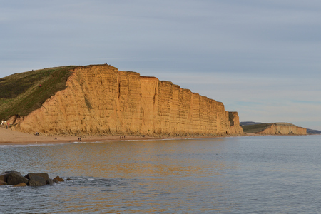 Scenic view of the east cliff at West bay in Dorsetの写真素材
