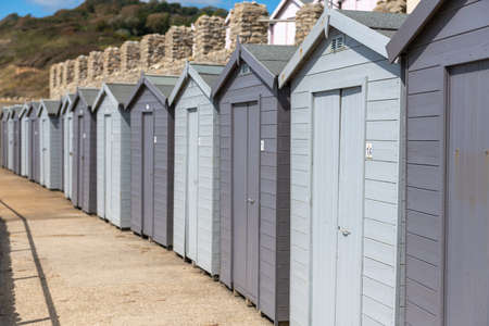 Row of beach huts at Charmouth beach in Dorsetのeditorial素材