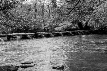 Black and white photo of the clapper bridge at Tarr Steps in Exmoor National Park