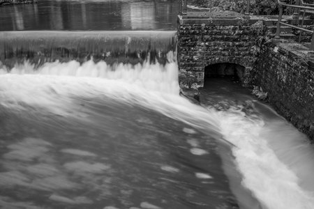 Black and white photo of a waterfall in Cheddar village in Somersetの写真素材