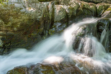 Long exposure of a waterfall on the East Lyn river at Watersmmeet In Exmoor National Park