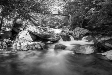 Long exposure of a waterfall on the East Lyn river at Watersmeet In Exmoor National Park