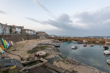Mousehole.Cornwall.United Kingdom.July 24th 2021.Landscape photo of the fishing village of Mousehole in Cornwall on a summer eveningのeditorial素材