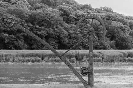 Cotehele quay.Cornwall.United Kingdom.July 23rd 2021.The crane at Cotehele quay in Cornwall.のeditorial素材