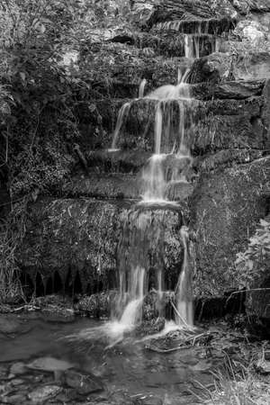 Taunton.Somerset.United Kingdom.August the 8th 2021.Long exposure of a waterfall at Hestercombe house and gardensのeditorial素材