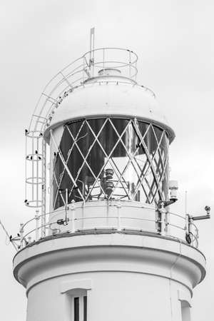 Close up of the top of Portland Bill lighthouse in Dorsetの写真素材