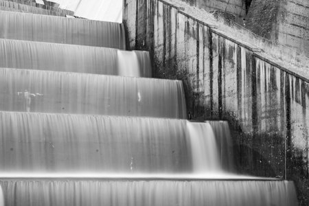 Long exposure of the waterfalls flowing over Wimbleball dam in Somersetの写真素材