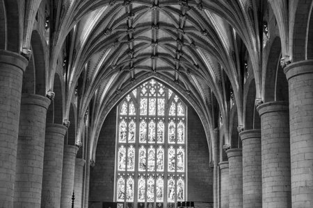 Tewkesbury.Gloucestershire.United Kingdom.June 2nd 2022.View of a stained glass window inside...