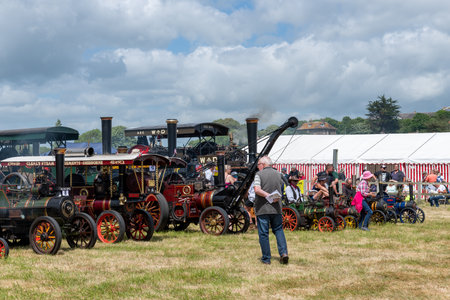 West Bay.Dorset.United Kingdom.June 12th 2022.A selection of miniature and full sized traction engines are being displayed at the West Bay vintage rallyのeditorial素材