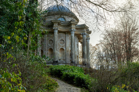 Photo of the last of the autumn colours at the Temple Of Apollo in Stourhead Gardens.の写真素材
