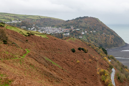 View from Countisbury Hill of the autumn colours at Lynton and Lynmouth in Devonの写真素材