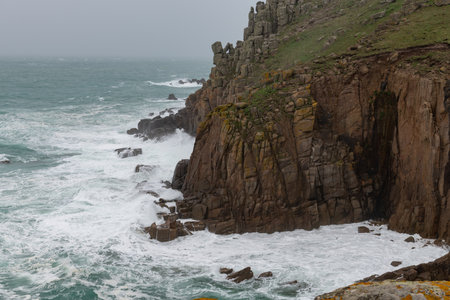 Landscape photo of the cliffs at Lands End in Cornwallの写真素材