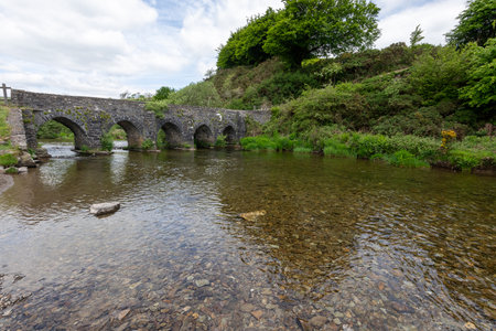 Photo of the river Barle flowing under Landacre bridge in Exmoor National Parkの写真素材