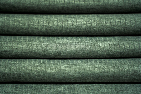 close up of green fabric texture, can be used as a backgroundの写真素材