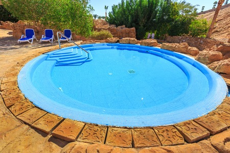 Landscape with nobody swimming pool at luxury hotel in the Egypt.
