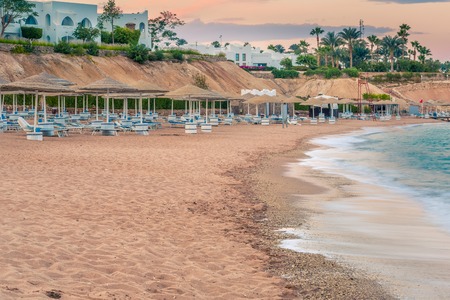Beautiful beach coast in the Red Sea at sunset, Egypt. Summer landscape. Travel holiday backgroundの写真素材