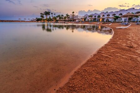 Beautiful beach coast in the Red Sea at sunset, Egypt. Summer landscape. Travel holiday backgroundの写真素材