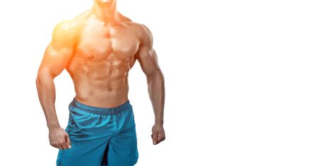 Strong Athletic Man showing muscular body and sixpack abs isolated on white background. with sun flare. copyspaceの写真素材